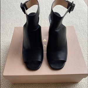 Prada black leather shoes with silver heels